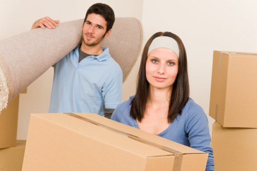 Organised secure storage unit in Newcross with packed boxes and furniture