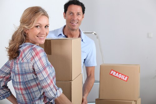 Packed boxes and furniture prepared for Newcross removals