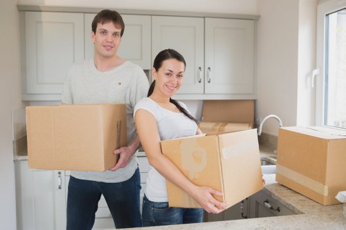 Careful packing of fragile items for a Newcross flat move
